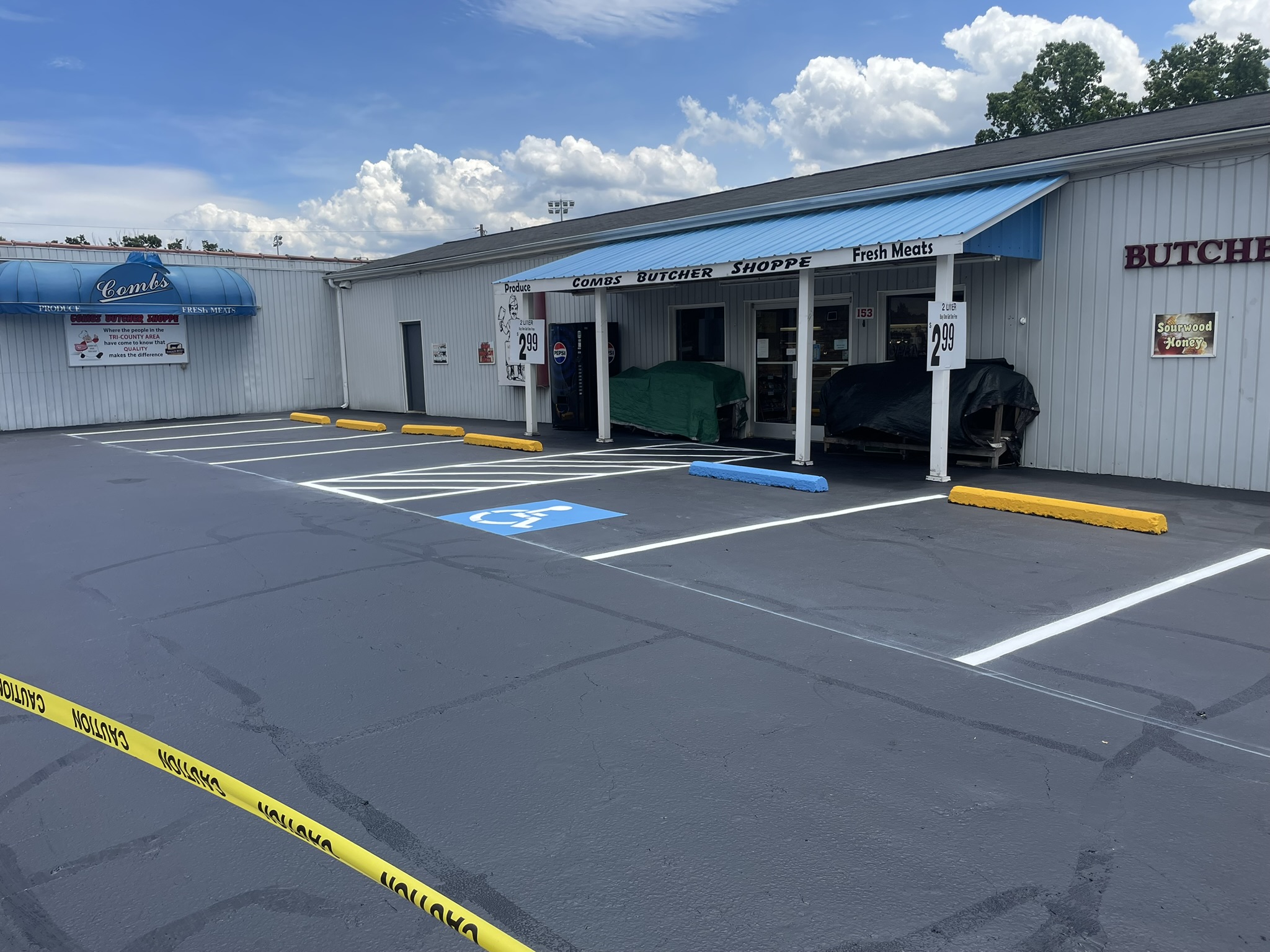 Commercial parking lot sealcoating and striping by Primescape Solutions