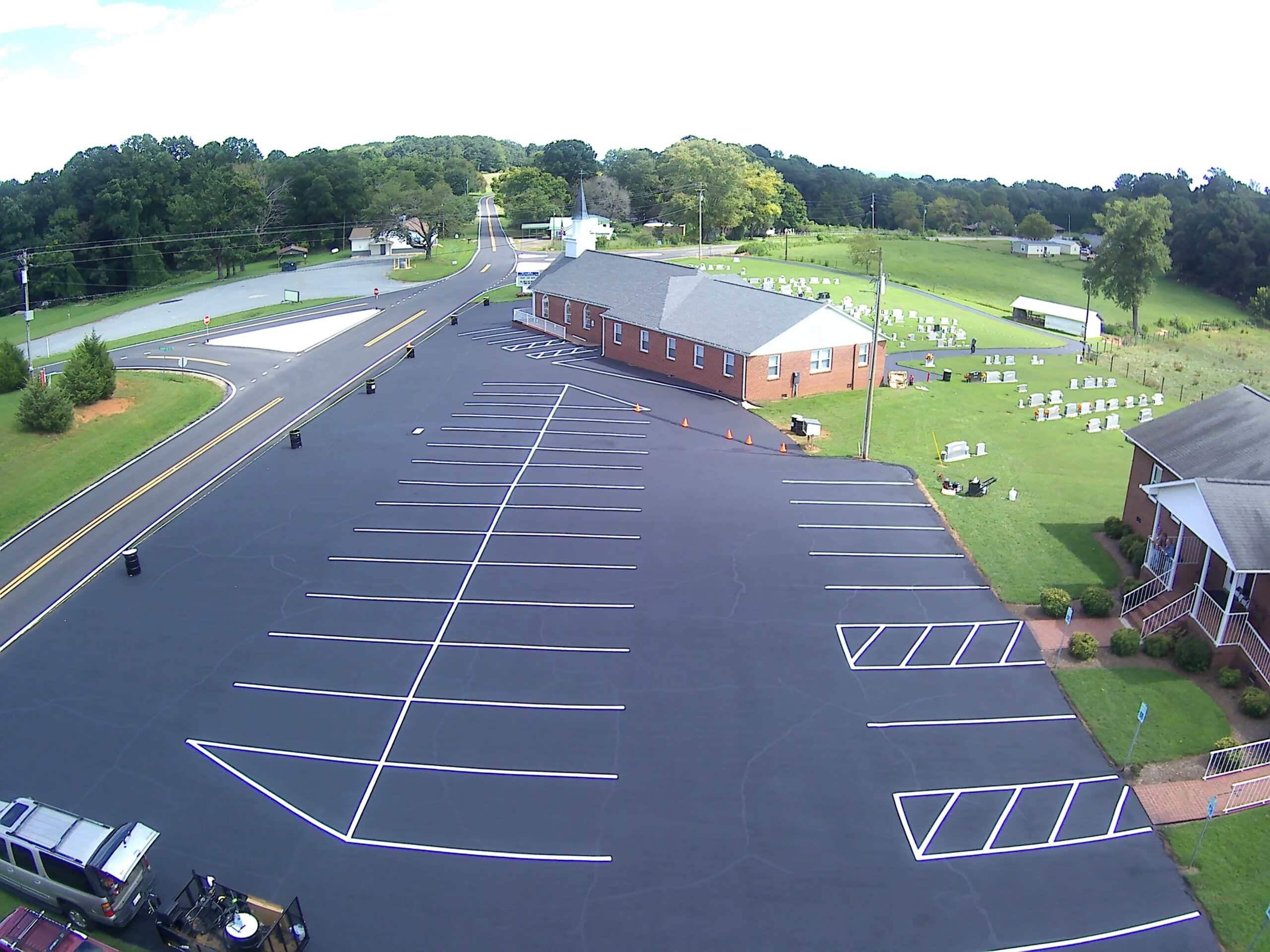 Church parking lot after crack repair and sealcoating